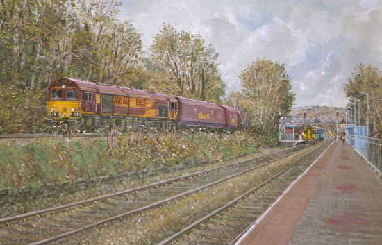 EWS 66066 coal train passing through Ystrad Mynach, Railway station.