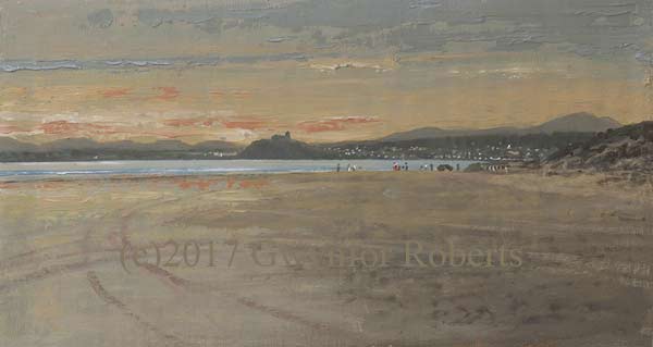 A Westerly view of Criccieth Castle with the evening sunset showing the castle high on its mound